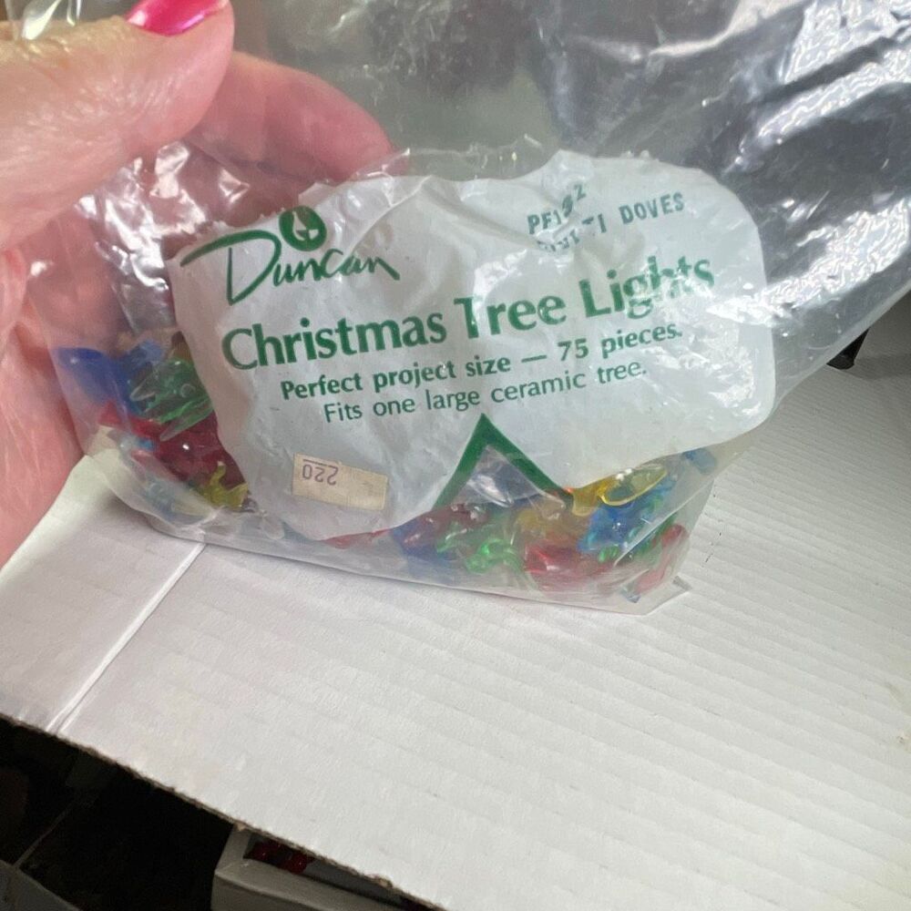 Duncan Doves lights for large ceramic tree. Approximately 130 pieces